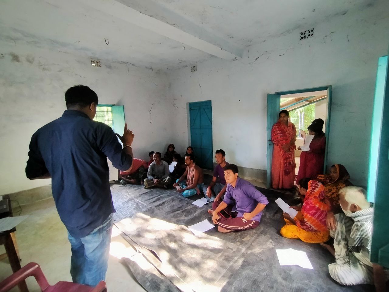 Community Correspondent Milon Mandal conducting a video talk in Baduria Block, North 24 Parganas, West Bengal.